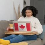 Canada flag on the laptop of a student