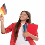 Germany flag with student holding books